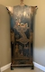 A chinoiserie decorated floor standing corner cabinet