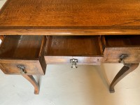 A George III oak lowboy Image 9