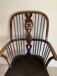 A wheel back Windsor arm chair Image 8