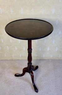 A mahogany tripod wine table Image 1