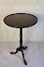 A mahogany tripod wine table